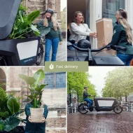 Bezorging van planten met een bakfiets in de stad